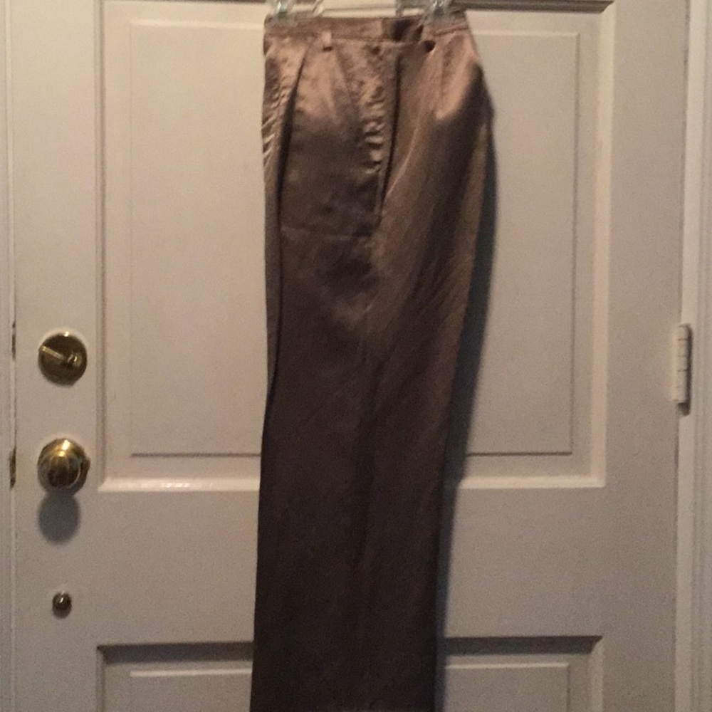 Calvin Klein jean style pants in gold. Hips 42”